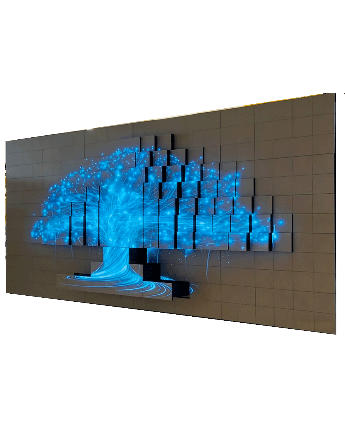 Kinetic LED wall with moving panels forming a glowing tree